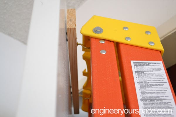 DIY-Over-the-door-hooks-for-a-ladder-