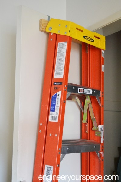 DIY over-the-door ladder holder